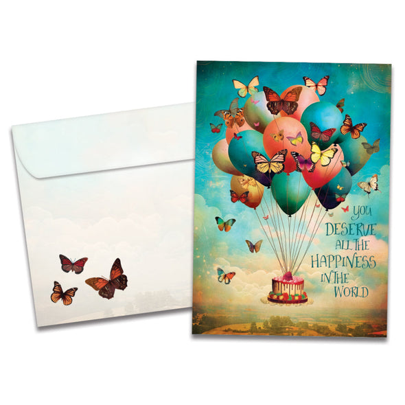 Cover of Happiness Balloons Birthday card (featuring serif text next to artwork of a cake surrounded by balloons and butterflies) and its matching envelope