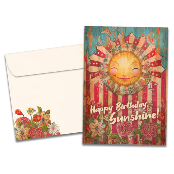 Cover of Happy Sunshine Birthday card (featuring serif text below artwork of the sun above various flowers) and its matching envelope