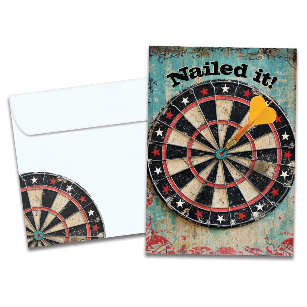 Cover of Nailed It Congratulations card (featuring serif text above artwork of a dart in the center of a dartboard) and its matching envelope