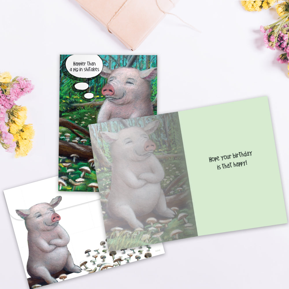 The inside of Tree-Free’s Pig in Shitakes card, with the cover and envelope in the background.