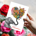 Load image into Gallery viewer, Lifestyle image(s) featuring Tree-Free’s Love Elephant Valentine card
