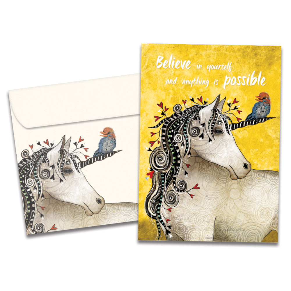 The cover of Tree-Free's Believe In You Unicorn card, along with its matching envelope.