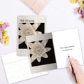 Load image into Gallery viewer, The inside of Tree-Free’s Thoughts And Hearts Sympathy Card card, with the cover and envelope in the background.
