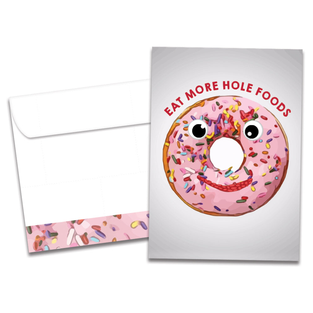 The cover of Tree-Free's Hole Foods card, along with its matching envelope.