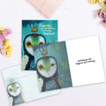 Load image into Gallery viewer, The inside of Tree-Free’s Happiness Owl Crown card, with the cover and envelope in the background.
