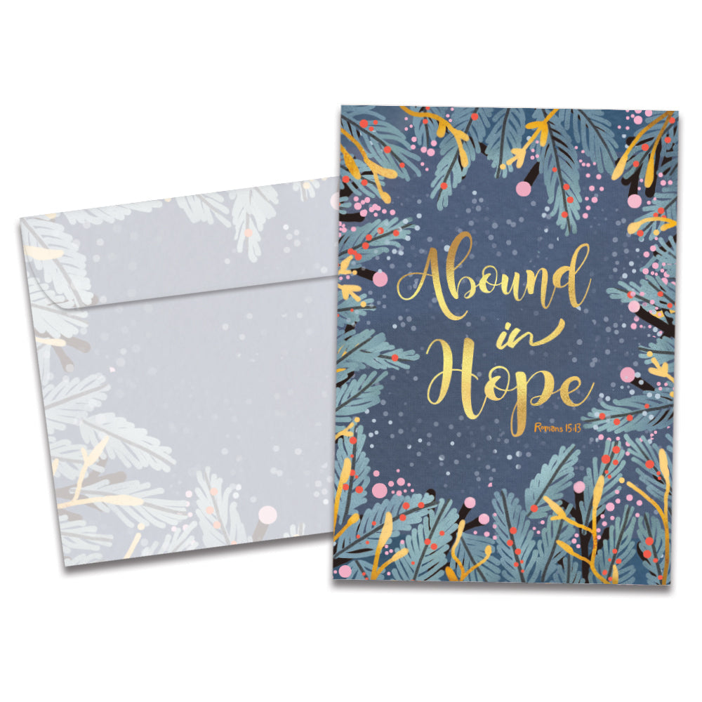 The cover of Tree-Free's Abound In Hope Holiday Card card, along with its matching envelope.