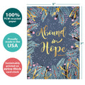 Load image into Gallery viewer, The cover of Tree-Free’s Abound In Hope Holiday Card card with lines demonstrating its 5x7 dimensions, along with the following text: “100% PCW recycled paper, proudly made in the USA, sustainably printed on extra-thick card stock”
