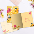 Load image into Gallery viewer, The inside of Tree-Free’s Smell The Flowers card, with the cover and envelope in the background.
