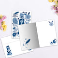 Load image into Gallery viewer, The inside of Tree-Free’s Find Peace All Occasion Card card, with the cover and envelope in the background.
