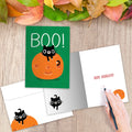 Load image into Gallery viewer, The inside of Tree-Free’s Boo Cat card, with the cover and envelope in the background.
