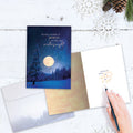 Load image into Gallery viewer, The inside of Tree-Free’s Peace In Winters Night card, with the cover and envelope in the background.
