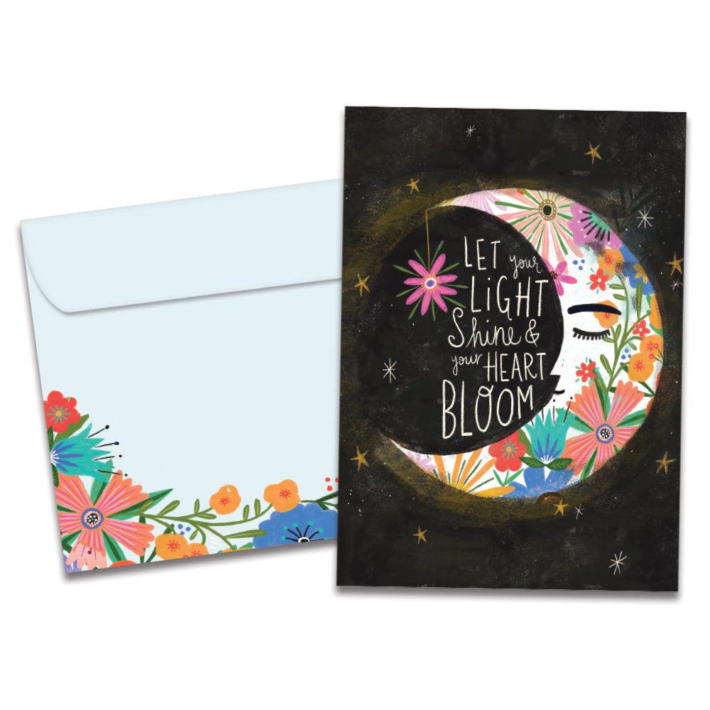 The cover of Tree-Free's Let Light Shine card, along with its matching envelope.