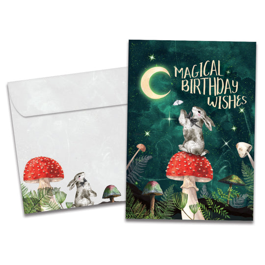 The cover of Tree-Free's Magical Wishes card, along with its matching envelope.