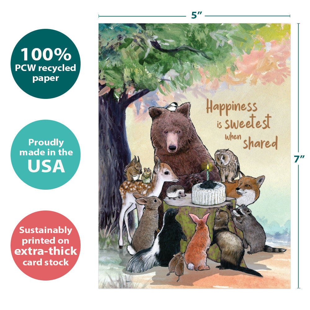 The cover of Tree-Free’s Sweetest When Shared card with lines demonstrating its 5x7 dimensions, along with the following text: “100% PCW recycled paper, proudly made in the USA, sustainably printed on extra-thick card stock”