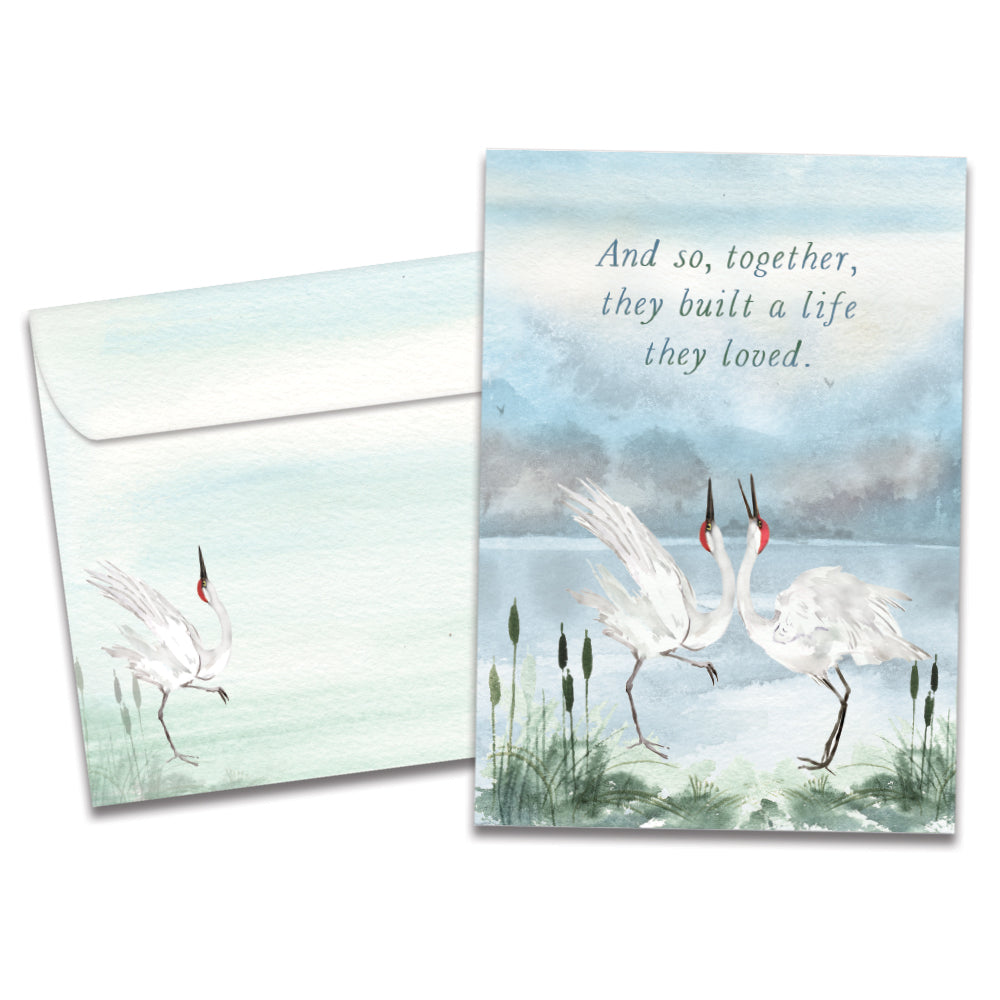 The cover of Tree-Free's Dancing Cranes card, along with its matching envelope.