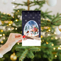 Load image into Gallery viewer, Lifestyle image(s) featuring Tree-Free&#39;s Sweet Snowglobe card
